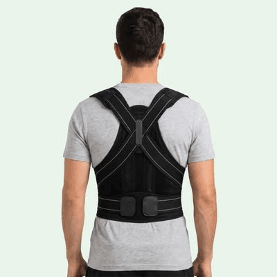 Figure-eight posture corrector worn over a shirt